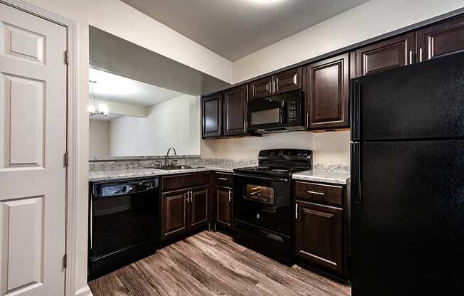 Renovated Kitchen with Dark Brown Cabinets