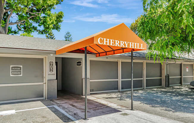 Cherryhill garage doors with a sign above them.