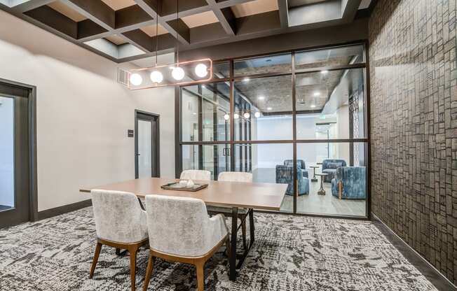 a conference room with a large table and chairs