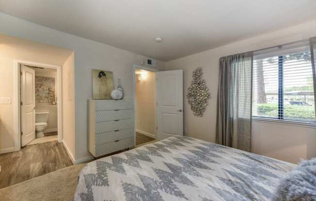 Bedroom with View of Hallway, Carpet, Window and White Dresser