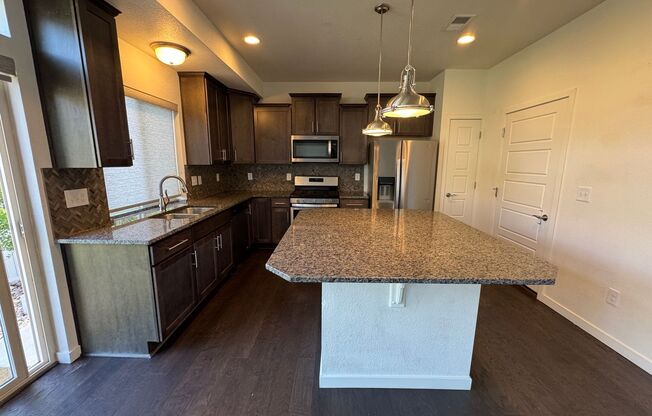 Modern Luxury Meets Urban Living – Stunning 3-Story Home with Rooftop Patio in Banning Lewis Ranch!