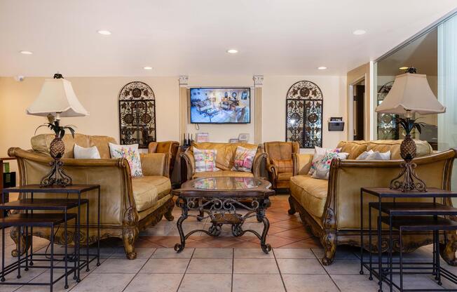 a living room filled with furniture and a fireplace