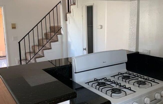 11833 GILMORE APTS.