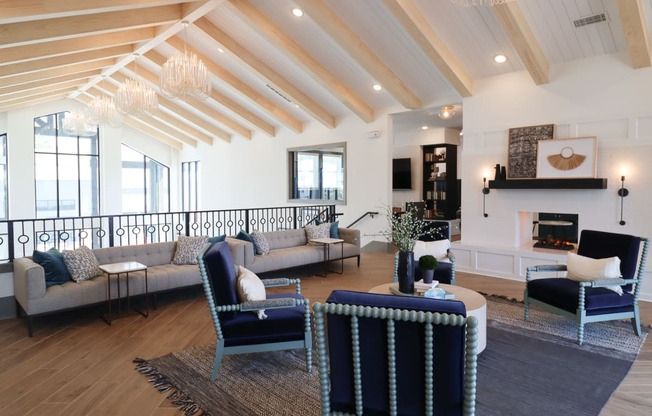 a living room with couches and chairs and a fireplace at The Crest at Acworth, Acworth, GA, 30102