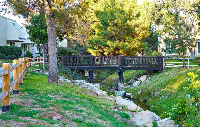 Green areas and bridge over the creek at Creekwood Villas
