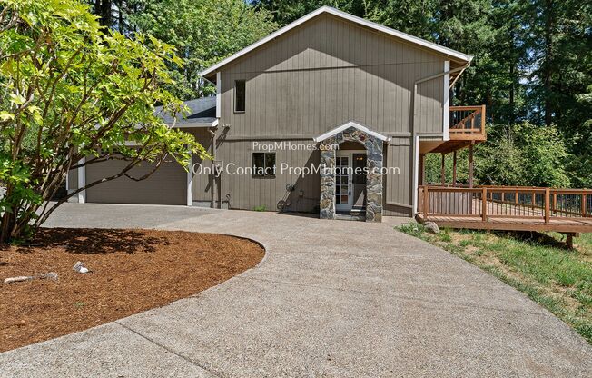 Spacious Home with Expansive Outdoor Living, Ample Parking! Forrest Like Setting!