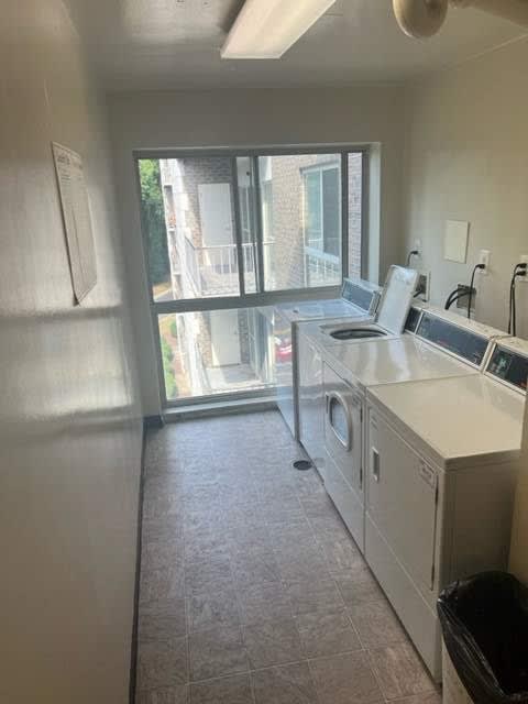 a laundry room with washer and dryer