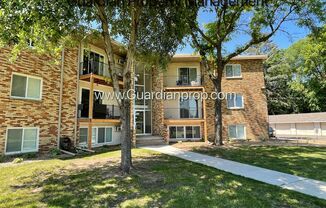 Top Floor with Balcony, Garage Available, Free Parking Space, Heat Paid, AC, Laundry
