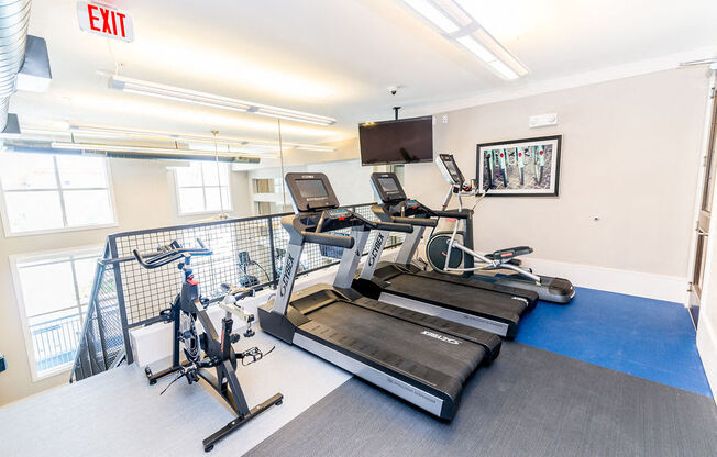 the gym is equipped with treadmills and other exercise equipment