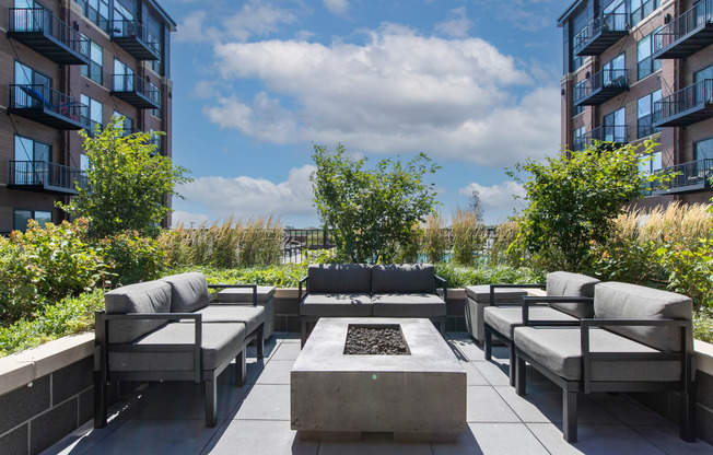 Maple Street Lofts - Fire Pit with Comfortable Seating, Between Two Buildings.