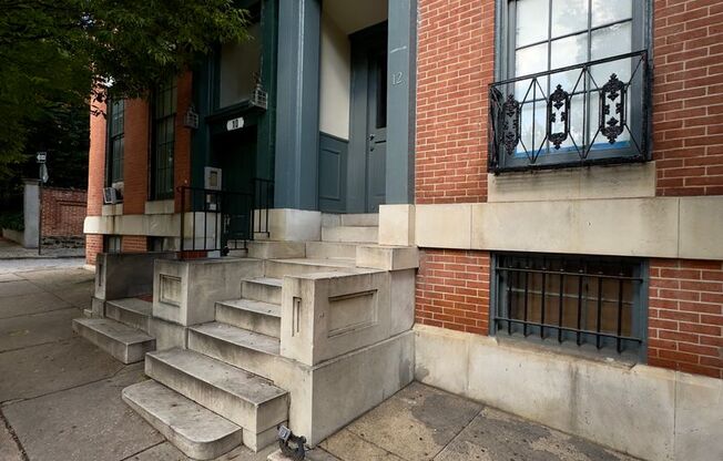 For Rent: Historic Charm at 12 E Madison St – Your Urban Sanctuary Awaits!