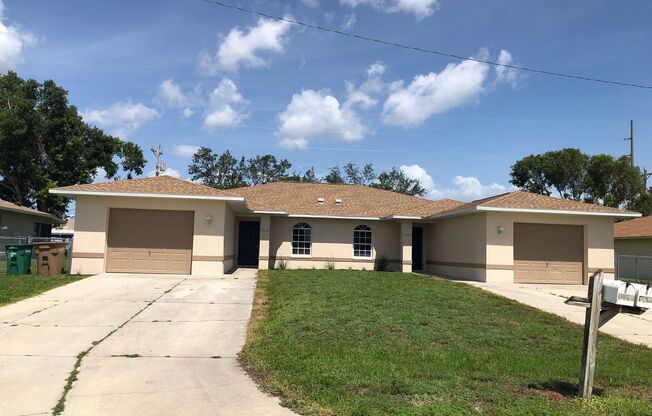 3 Bedroom 2 Bath SW Cape Coral Duplex with Garage and Screened Lanai