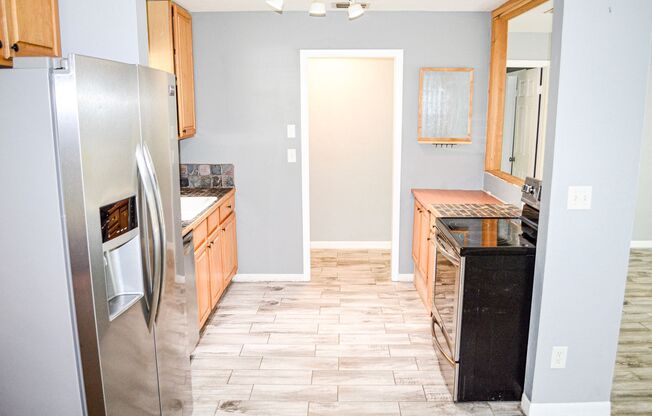 Check out this huge private fenced back yard at this Timberlane home!