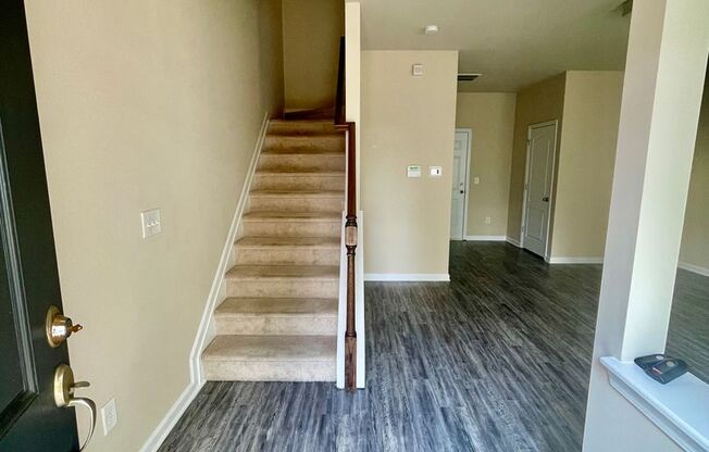 This Stunningly Tri-Level Town Home is Located in the Prestigious and Illustrious Brighton Park Community in Mint Hill, NC