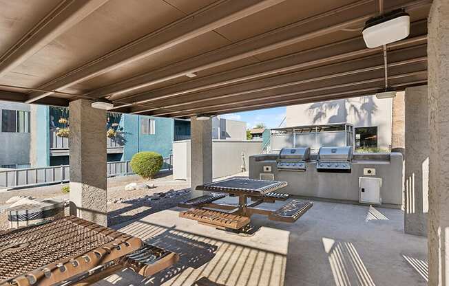 Outdoor BBQ Area with Canopy at Tanque Verde Apartments located in Tucson, AZ.