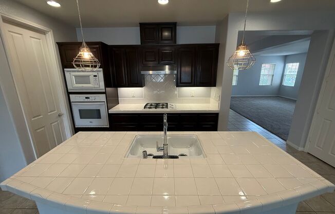Elegant 4-Bedroom, 3-Bathroom Home with 3-Car Garage in the Gated Mayfair Community