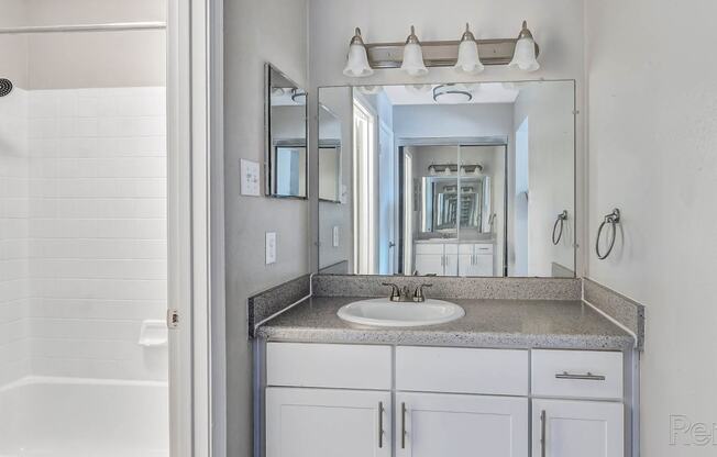 Bathroom with Vanity at The Willows on Rosemeade, Texas 75287