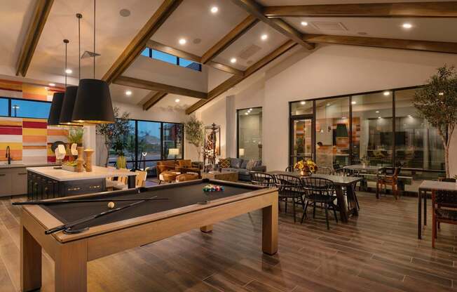 a game room with a pool table and a dining area at Weylyn Luxury Apartments, Laveen, Arizona