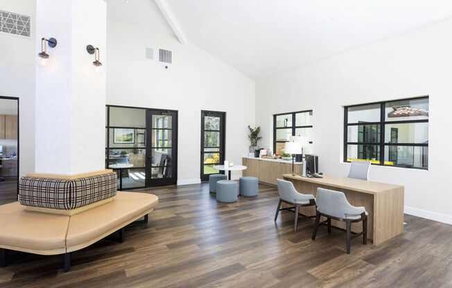 a living room with a couch and chairs and a desk at La Jolla Blue, San Diego, 92122