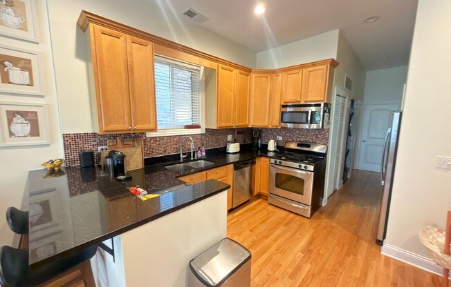 Beautifully updated & maintained 2 bed/2 bath Noble Square condo in an intimate 3 unit building.