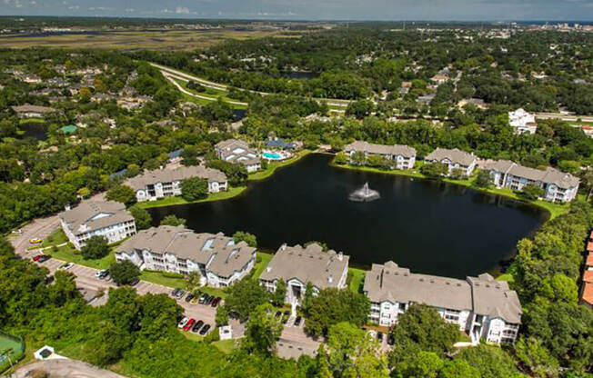 an aerial view of a lakeside community with a sailboat in the lake  at Ocean Park, Jacksonville Beach, 32250