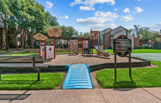 a playground with a slide and other play equipment