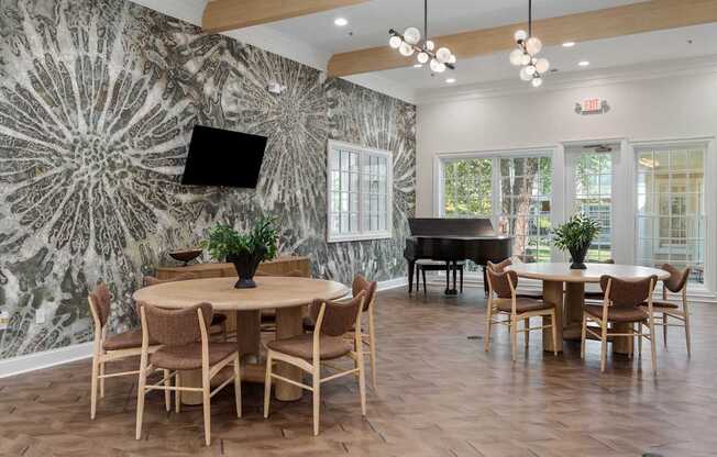 Multipurpose room with piano and seating at The Orchard, Dublin, OH, 43016