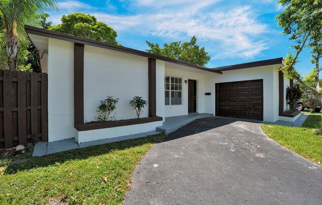 Sunrise Gem: Updated 2-Bed, 2-Bath with Garage Parking