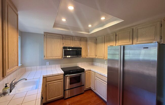 LARGE TWO BEDROOM TWO AND ONE-HALF BATH CONDO WITH LOFT AND GARAGE IN PACHECO VALLEY