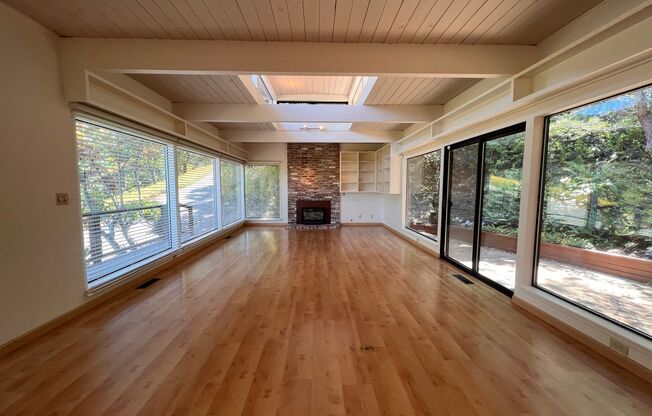 DELIGHTFUL FOUR BEDROOM TWO AND HALF BATH HOME IN WEST CORTE MADERA WITH STUNNING MT TAM VIEWS