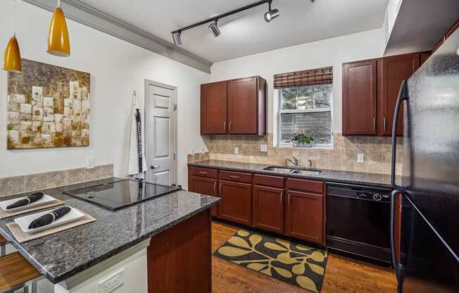 luxury kitchen at Berkshire Aspen Grove apartments 7317 South Platte River Pkwy., Littleton, CO 80120