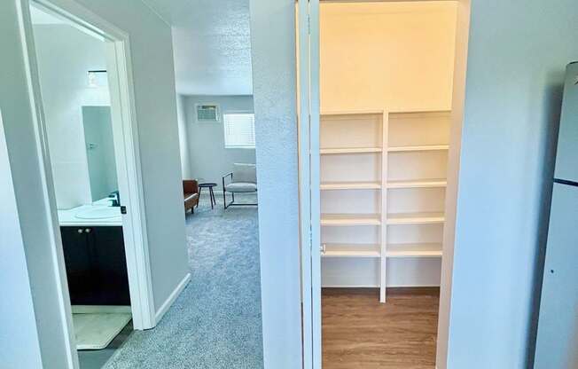 Campbell Plaza Apartments
710 Nido Drive, Campbell, CA 95008. A room with a white door and a white shelving unit.