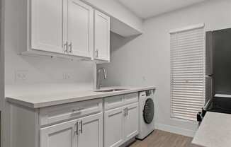 the preserve at ballantyne commons apartment kitchen with washer and dryer