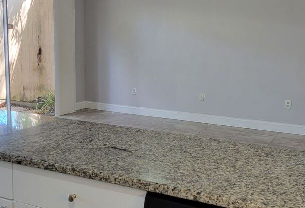 Annual UNfurnished ground floor beautifully renovated downtown Sarasota condo.