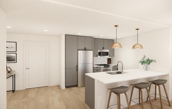 Sleek kitchens at Modera Bridle Trails feature spacious islands, designer finishes, and open layouts.