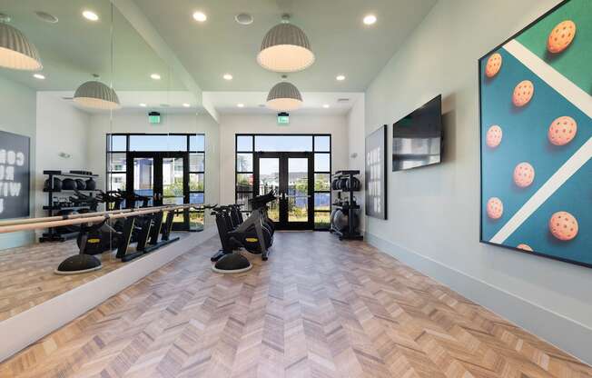 spin and yoga studio with huge mirrors and TV at Lake Nona Concorde