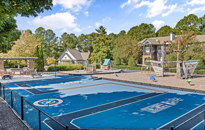 basketball court at the preserve at green trees apartments at View at Lake Lynn, North Carolina