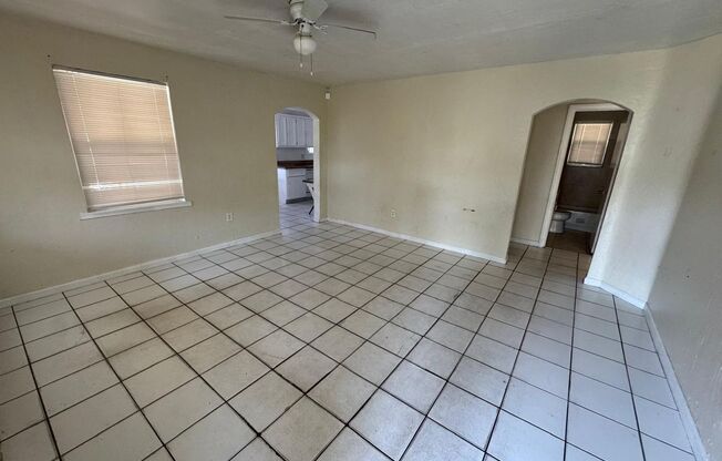 Large 4-1 house with car port and fenced backyard