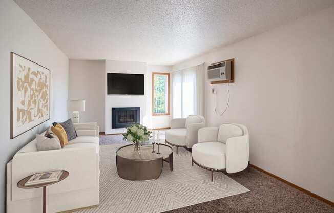 a living room with white furniture and a fireplace.Fargo, ND Westview Towers Apartments