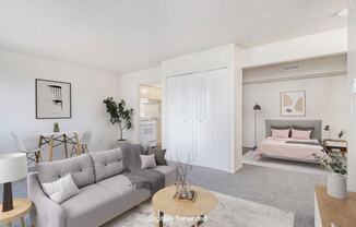 a living room with a couch and a bed at Old Farm Apartments, Elkhart, 46517