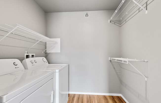 walk in closet with laundry