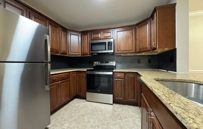 Oviedo 2/2 Condo with Tile & LVP Flooring, Updated Baths, New Paint & Appliances!