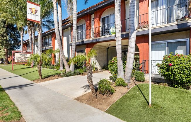 A building with a red and white sign on the front.