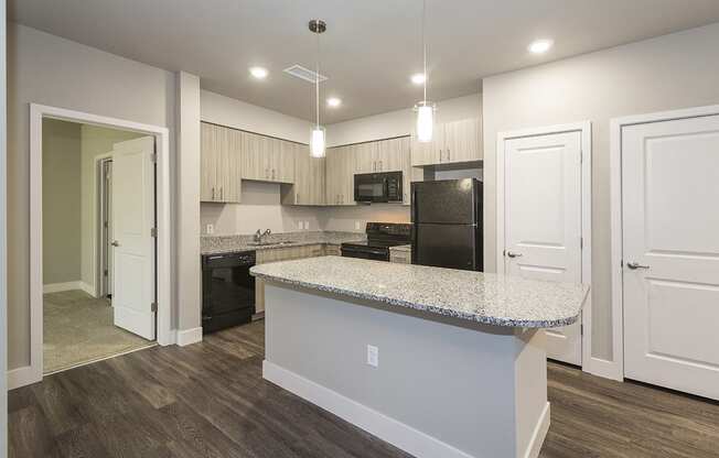 Full Kitchen with Granite Countertops at Northgate Colorado Springs Apartments for Rent