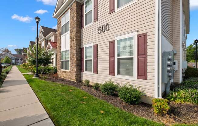 our apartments are located in a quiet neighborhood with a sidewalk