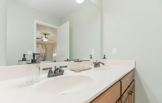 Renovated Bathrooms With Quartz Counters at Prairie Pines Townhomes, Shawnee, Kansas