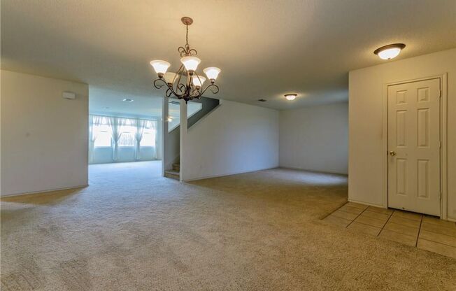 This four-bedroom home has a huge room with a versatile floor plan.