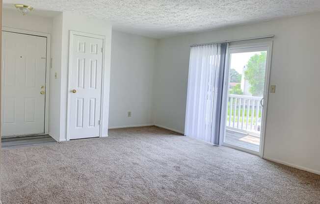 Spacious living room at Waterstone Place Apartments in Indianapolis, IN 46229