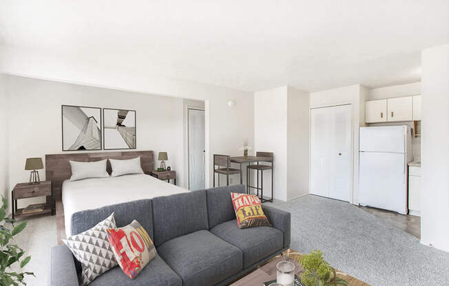a living room leading to the kitchen at Seville Apartments in Kalamazoo, MI 49009