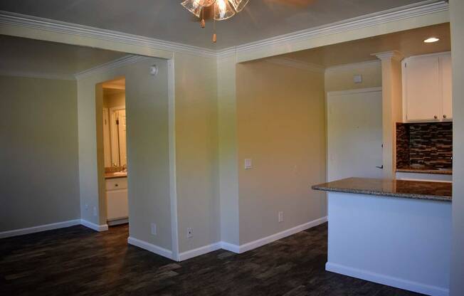 living room view looking towards kitchen and guest bathroom